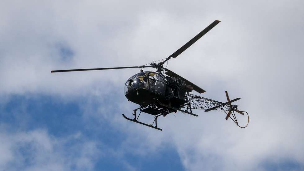 epa11077438 Ecuadorian soldiers are seen in a helicopter during an operation to take control of the Sierra Centro Norte Cotopaxi Regional Social Rehabilitation Center, in the city of Latacunga, Ecuador, 14 January 2024. Following the attacks and violent acts that occurred on 09 January in the country, Noboa decreed a state of emergency, declared the existence of an internal armed conflict, and ordered the Public Force to carry out security and control operations in different locations in Ecuador.  EPA/Jose Jacome