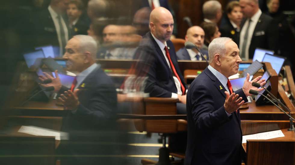 epa12629218 Israeli Prime Minister Benjamin Netanyahu (R) speaks during a debate initiated by the opposition as part of a plenary session in the Knesset, the Israeli parliament, in Jerusalem, 05 January 2026. The title of the debate submitted by the opposition is 'An extremist government that acts contrary to the Zionist majority and harms national cohesion and the fundamental values of the State of Israel'.  EPA/ABIR SULTAN EPA