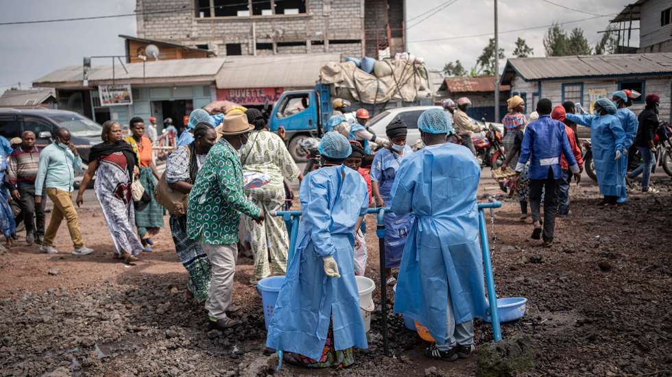 epaselect epa12997437 Health workers in protective gowns and masks operate at a checkpoint set up for preventive measures against Ebola in Kanyaruchinya, near Goma, North Kivu, Democratic Republic of Congo, 27 May 2026. The World Health Organization (WHO) has declared the Ebola outbreak, caused by the Bundibugyo virus, in the Democratic Republic of the Congo a public health emergency of international concern.  EPA/MARIE JEANNE MUNYERENKANA