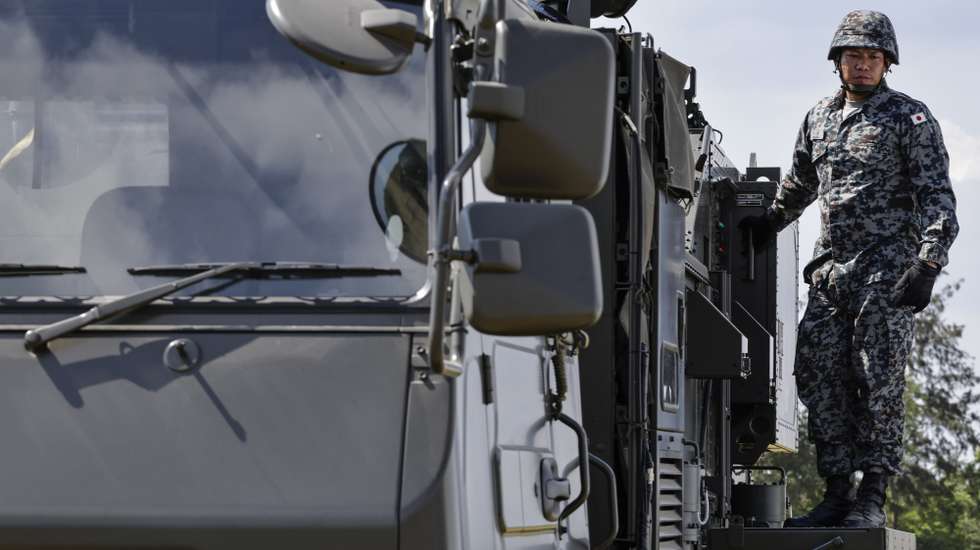 epa12918526 An officer of the Japan Air Self Defense Force stands on the side of a Fire Control System on static display at their observer camp during a Philippines-United States Balikatan joint military exercise at a Philippine Navy Camp in San Antonio town in Zambales province, north of Manila, Philippines, 28 April 2026. The Philippines and the US are conducting the 41st iteration of joint military exercises, and are joined by partner delegations from Australia, Canada, France, Japan, and New Zealand.  EPA/ROLEX DELA PENA