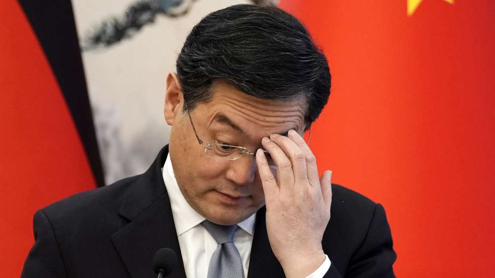 epa10571906 Chinese Foreign Minister Qin Gang puts a hand on his face during a joint press conference with German Foreign Minister Annalena Baerbock (not pictured) at the Diaoyutai State Guesthouse in Beijing, China, 14 April 2023.  EPA/SUO TAKEKUMA / POOL