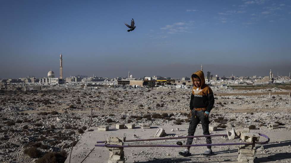 epaselect epa11790833 A young boy walks on top of a building in the Yarmouk refugee camp on the outskirts of Damascus, Syria, 19 December 2024 (issued 23 December 2024). Established in 1957, some 160,000 Palestinians lived in Yarmouk according to UNRWA until the start of the Syrian uprising in 2011. Fierce fighting led to the displacement of a large number of inhabitants in 2012 and access to humanitarian aid was severly limited following its besiegement by the then Syrian government of Bashar al-Assad in 2013.  EPA/ANTÓNIO PEDRO SANTOS