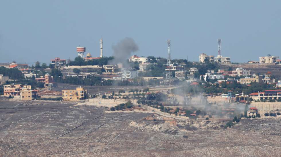 epa10938257 Smoke rises from the Lebanese village of Maroun Al Ras, near the Israeli village of Avivim, as a result of Israeli artillery shelling, 25 October 2023. According to an Israeli army spokesperson, an anti-tank missile was launched from Lebanon towards Israeli soldiers in the area of Avivim. No injuries have been reported. In response, Israeli army tanks and artillery fired back at the source of the attack.  EPA/ATEF SAFADI