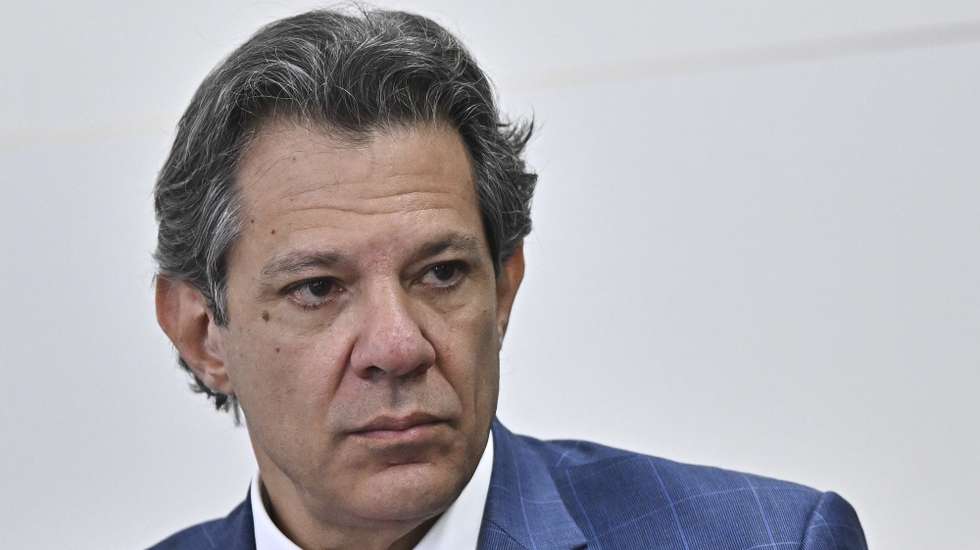 epa12239464 Brazilian Finance Minister Fernando Haddad participates in a meeting with representatives of the industrial sector at the Ministry of Development, Industry, and Commerce in Brasilia, Brazil, 15 July 2025. The inter-ministerial committee created by Brazilian President Luiz Inacio Lula da Silva to respond to the 50 percent tariff announced by the United States government is meeting for the first time with representatives of the industry and agricultural sectors.  EPA/ANDRE BORGES