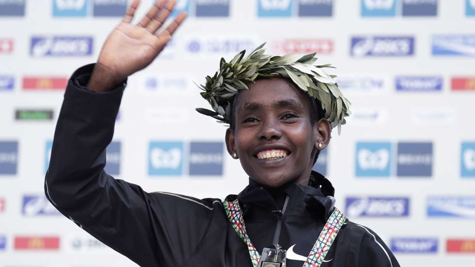 epa07410273 Ruti Aga of Ethiopia celebrates after winning the women's race of the Tokyo Marathon 2019 in Tokyo, Japan, 03 March 2019. Aga won the race while Helen Tola of Ethiopia finished second and Shure Demise of Ethiopia finished third. Some 38,000 runners participated in the Tokyo Marathon, one of the six races in the World Marathon Majors (WMM).  EPA/KIYOSHI OTA
