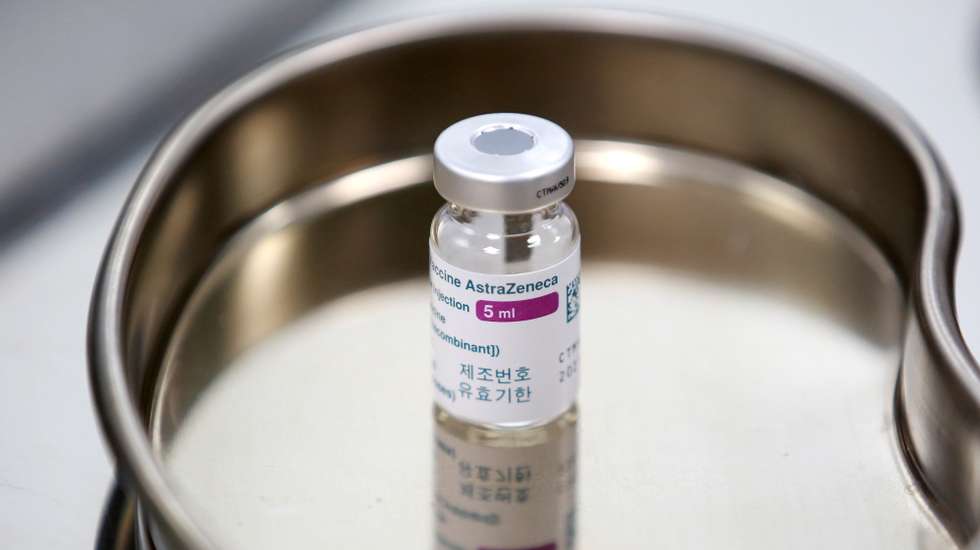 epa09079044 A vial of COVID-19 vaccine developed by AstraZeneca sits on a tray at a vaccination center of the Vietnam Vaccine Joint Stock Company (VNVC), in Hanoi, Vietnam 17 March 2021. Major European countries have temporarily suspended the use of the AstraZeneca jab following reports of side effects such as blood clots.  EPA/LUONG THAI LINH