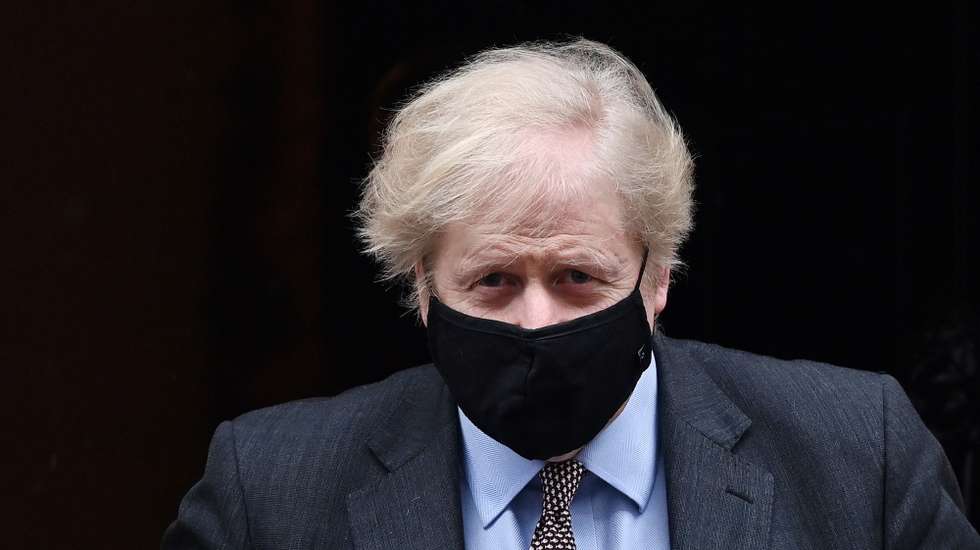 epa08983965 British Prime Minister Boris Johnson departs 10 Downing Street for Prime Minister Questions at parliament in London, Britain, 03 February 2021. Johnson faces the MPs' weekly question time in the House of Commons.  EPA/ANDY RAIN