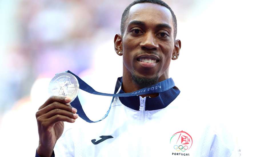 epa11543446 Silver medalist Pedro Pichardo of Portugal during the medal ceremony for the Men Triple Jump event of the Athletics competitions in the Paris 2024 Olympic Games, at the Stade de France stadium in Saint Denis, France, 10 August 2024.  EPA/VASSIL DONEV