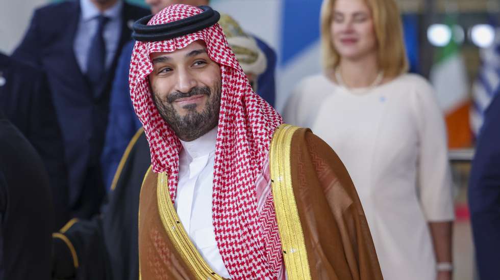 epa11662738 Saudi Arabian Crown Prince and Prime Minister Mohammed bin Salman bin Abdulaziz Al Saud reacts during a family photo at the EU-Gulf Cooperation Council (GCC) summit in Brussels, Belgium, 16 October 2024. This is the first summit between the EU leaders and the GCC, aiming to develop a closer partnership. The European Union is the second-largest trade partner for the GCC countries, generating €170 billion in trade in 2023, imports of mineral fuels accounted for over 75% of EU imports from GCC countries. Since 2020, fuel imports have more than tripled mainly due to the armed conflict between Russia and Ukraine.  EPA/CHRISTOPHER NEUNDORF