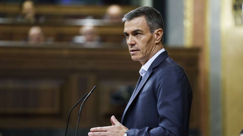 epa13060174 Spain's Prime Minister Pedro Sanchez speaks during a plenary session at the Congress of Deputies, in Madrid, Spain, 24 June 2026. Prime Minister Sanchez appears before the Spanish lower house of parliament to defend his government's record amid a series of corruption cases and judicial investigations affecting his party PSOE and its inner circle.  EPA/CHEMA MOYA