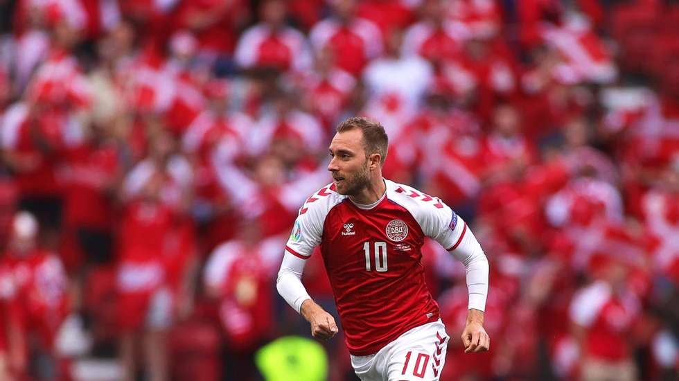 epa09826443 (FILE) - Christian Eriksen of Denmark in action during the UEFA EURO 2020 group B preliminary round soccer match between Denmark and Finland in Copenhagen, Denmark, 12 June 2021 (re-issued on 15 March 2022). Christian Eriksen has been called up for the Danish national soccer team for the first time after suffering a cardiac arrest at the UEFA EURO 2020, Denmark coach Kasper Hjulmand announced on 15 March 2022.  EPA/Friedemann Vogel *** Local Caption *** 56962391