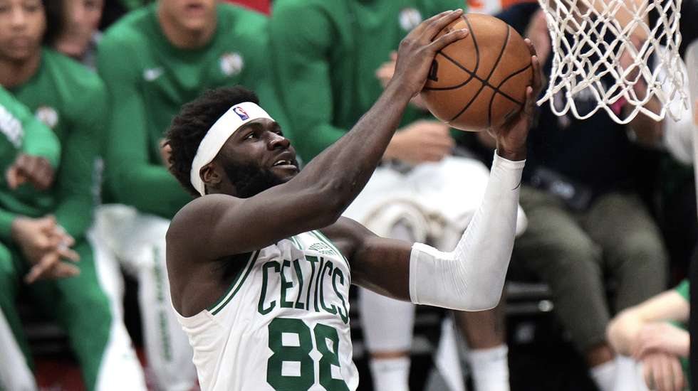 epa11042646 Boston Celtics center Neemias Queta lays up the ball during the second half of the NBA basketball game between the Boston Celtics and Los Angeles Clippers in Los Angeles, California, USA, 23 December 2023.  EPA/ALLISON DINNER  SHUTTERSTOCK OUT