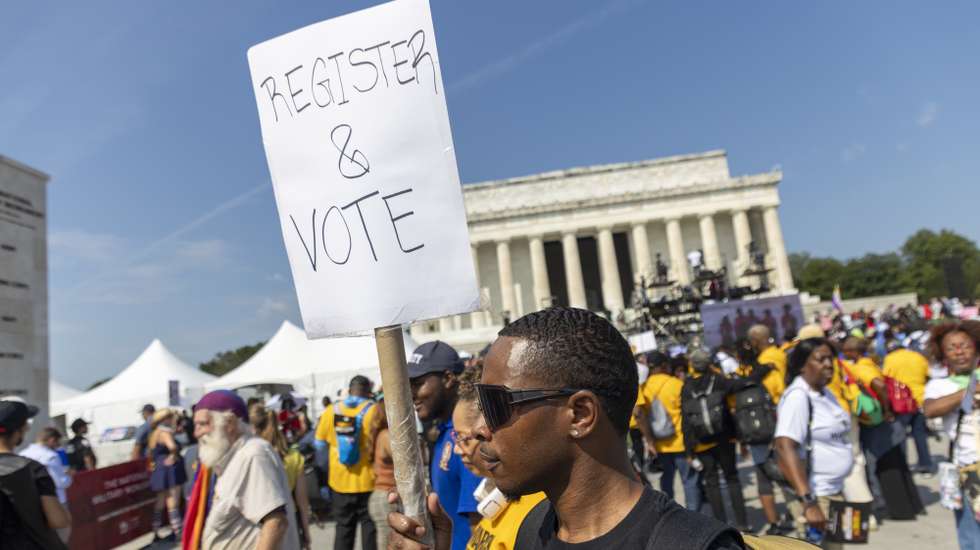 epa13197039 Activists attend the '2026 March on Washington: Defend the Vote' marking the 63rd anniversary of the 1963 March on Washington at the Lincoln Memorial in Washington DC, USA, 28 August 2026. The march comes just weeks before the November midterm elections, with organizers using the demonstration to mobilize voters and make voting rights a central issue in the campaign.  EPA/SHAWN THEW