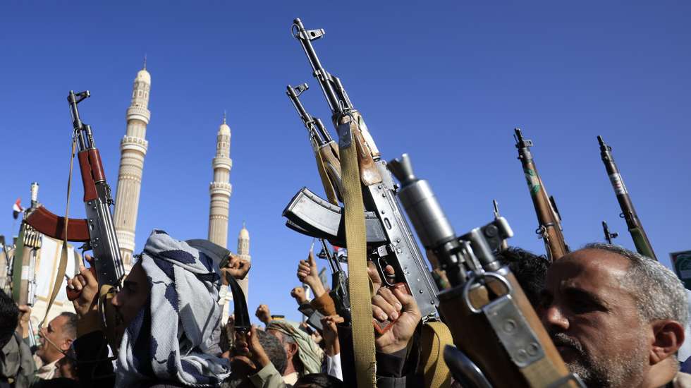 epa13292237 Houthi supporters hold up weapons during a protest against Saudi Arabia, in Sana'a, Yemen, 09 October 2026. Thousands of Houthi supporters rallied in Sana'a to protest against Saudi Arabia amid an escalation in fighting after Yemen's Saudi-backed government announced a military campaign on 04 October to retake Houthi-held territory.  EPA/YAHYA ARHAB