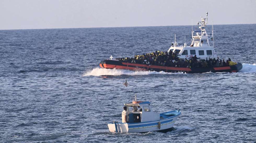 epa10863563 A boat carrying migrants arrive on the island in Lampedusa, Italy, 16 September 2023. Italian Deputy Premier and Foreign Minister Antonio Tajani on 15 September called for the intervention of the United Nations in response to the significant increase in the arrival of migrants and refugees by sea to Italy in recent days. Lampedusa's city council declared a state of emergency on 13 September evening after a 48-hour continuous influx of migrants.  EPA/CIRO FUSCO