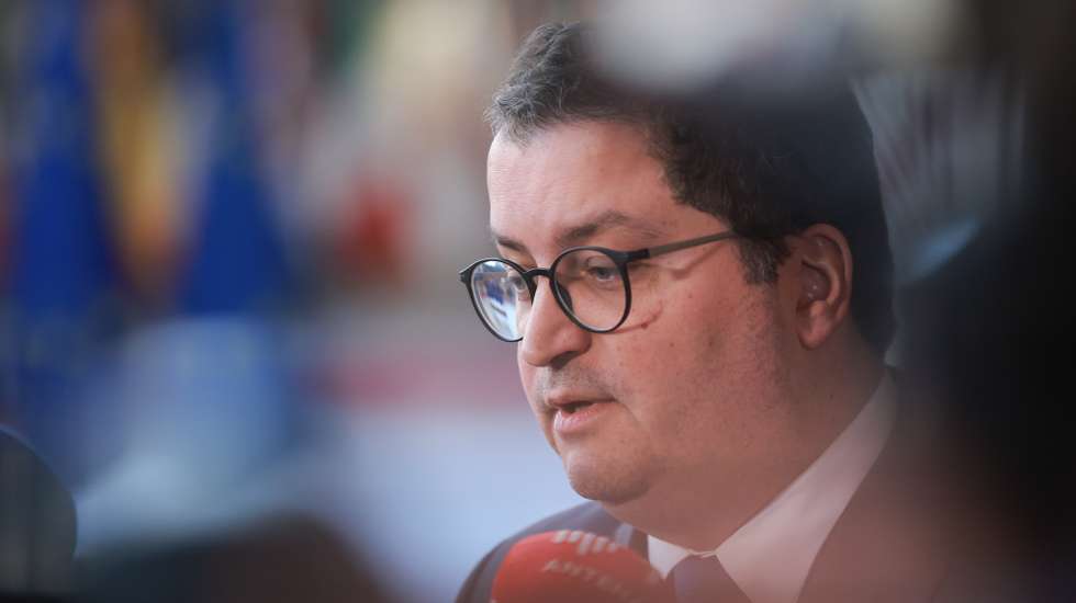 epa11902831 Portuguese Finance Minister Joaquim Miranda Sarmento talks to the media as he attends an Eurogroup Finance Ministers Meeting in Brussels, Belgium, 17 February 2025. Bulgarian Finance Minister will attend the meeting and update ministers on the country's progress in meeting the criteria for adopting the euro.  EPA/OLIVIER HOSLET