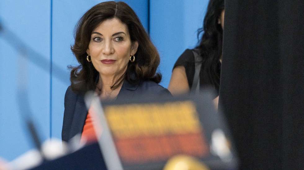 epa09999205 New York Governor Kathy Hochul arrives for a bill signing ceremony for new gun safety legislation at a community center in the Bronx borough of New York, New York, USA, 06 June 2022. The new laws were passed by state lawmakers last week and implement new gun safety regulations including raising the minimum age to purchase a semiautomatic rifle to 21, broadening the state's 'red flag' law that allows courts to seize the weapons of anyone determined to be a danger to themselves or to others, and restricting the sale of bullet proof vests.  EPA/JUSTIN LANE