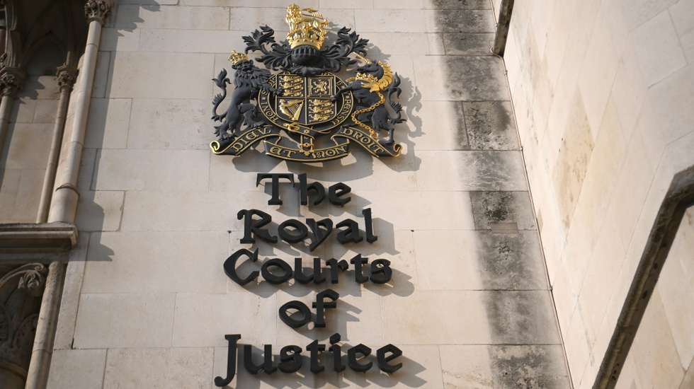 epa09846551 A general view of the Royal Courts of Justice in London, Britain 24 March 2022. London's High Court ruled that Spanish emeritus King Juan Carlos (not pictured) is not covered by sovereign immunity and could therefore proceed with the ex-lover Corinna zu Sayn-Wittgenstein's legal complaint against him.  EPA/NEIL HALL