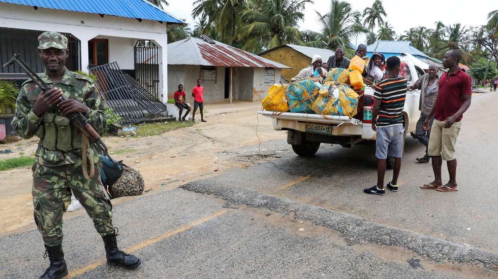 epa09131124 Residents try to return to normality in Palma, Cabo Delgado, Mozambique, 12 April 2021. The violence unleashed more than three years ago in Cabo Delgado province escalated again about two weeks ago, when armed groups first attacked the town of Palma.  EPA/JOAO RELVAS