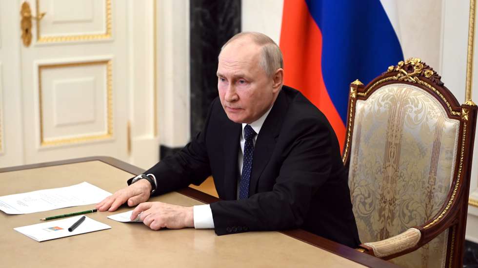 epa10752114 Russian President Vladimir Putin attends a video conference from the Moscow Kremlin to discuss an emergency on Crimean Bridge, in Moscow, Russia 17 July 2023. The Investigative Committee of Russia said that one of the sections of the Crimean bridge was damaged in the night of 16 to 17 July. Two civilians, a man and a woman, were killed while driving a car across the bridge; their minor daughter was injured in the incident, the statement added. Russia has blamed 'special services of Ukraine' for the 'attack', and said it launched a criminal investigation into the incident.  EPA/ALEXANDER KAZAKOV / SPUTNIK / KREMLIN POOL