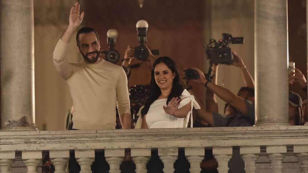 epa11128266 The current president and winner of reelection, Nayib Bukele (L), speaks from the National Palace with his wife Gabriela Rodriguez de Bukele (R) in San Salvador, El Salvador, 04 February 2024. The preliminary count of the presidential elections in El Salvador gives an overwhelming victory to Nayib Bukele with 1,090,522 votes for his party, Nuevas Ideas (NI), well ahead of the Farabundo Marti National Liberation Front (FMLN, left) with 93,846, and the Nationalist Republican Alliance (Arena, right), with 81,102, according to data released by the Supreme Electoral Tribunal (TSE), which must be ratified in final scrutiny.  EPA/Rodrigo Sura