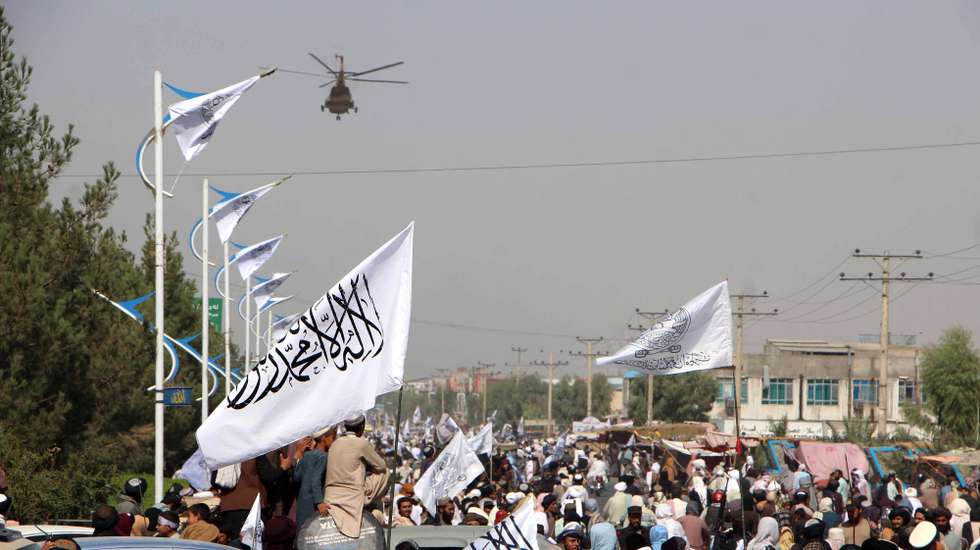 epa11548690 Supporters of Taliban authorities mark the third anniversary of the Afghan government takeover in Kandahar, Afghanistan, 14 August 2024. The Taliban seized control of Kabul on 15 August 2021, following the collapse of the US-backed government amidst the chaotic withdrawal of foreign troops. Despite their consolidation of power and claims of improved security, the Taliban government remains unrecognized internationally, facing criticism for severe restrictions on women and a worsening humanitarian crisis affecting 23.7 million Afghans in need of assistance.  EPA/QUDRATULLAH RAZWAN