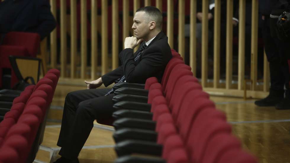 epa12793788 Former Greek deputy Ilias Kasidiaris, who was sentenced by a first instance court to 13 years in jail for a member of the leading group of neo-Nazi party Golden Dawn, waits for the announcement of the verdict during the appeal hearing of the imprisoned leaders of the Golden Dawn criminal organization in Athens, Greece, 04 March 2026. The Five-Member Felonies Court of Appeal, which tried the case at second instance concerning the long-standing violent activities of the criminal organization Golden Dawn, found all 42 defendants guilty, upholding the first-instance ruling. According to the indictment, the case concerns a Nazi-type organization accused of crimes against life that entered parliament as a political party in 2012, becoming the country’s third-largest parliamentary force.  EPA/YANNIS KOLESIDIS
