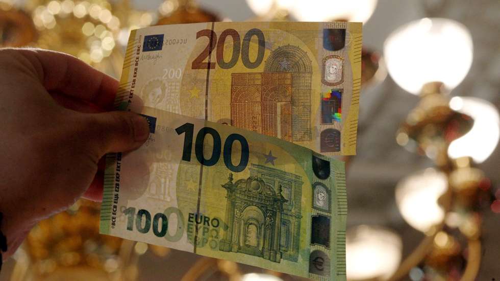 epa07596701 A view of new euro banknotes in Riga, Latvia, 24 May 2019. Latvia will be launching new 100 euro and 200 euro banknotes On 28th May 2019. These are the latest European series of banknotes with refurbished design and advanced security features.  EPA/Toms Kalnins