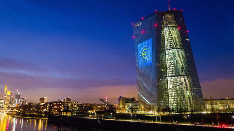 epa09666102 The European Central Bank (ECB) headquarters is illuminated with various motifs to mark the 20th anniversary of the euro in Frankfurt am Main, Germany, 01 January 2022 (issued 04 January 2022). The light show was launched on 01 January and will illuminate the ECB headquarters in the evening for the first ten days of the month.  EPA/CONSTANTIN ZINN