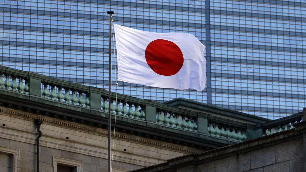 epa12635979 The Japanese national flag flutters at the Bank of Japan (BOJ) headquaters in Tokyo, Japan, 08 January 2026. The Bank of Japan is continuing to nominally raise their interest rates from near zero, in December 2025 raising rates 25 basis points.  EPA/FRANCK ROBICHON