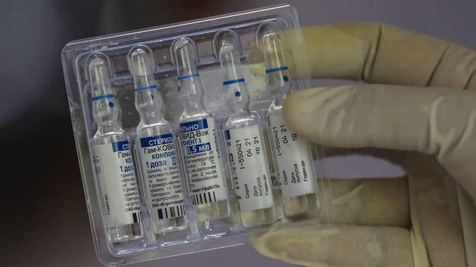 epa09180353 A health worker holds vials of the Russian Sputnik V COVID-19 vaccine at a regional medical clinic in Colombo, Sri Lanka, 06 May 2021. Sri Lanka received 15,000 doses of the Sputnik V COVID-19 vaccinesÂ from RussiaÂ on 04 May. Sri Lanka is facing a new wave of COVID-19 infections and the number of infection cases is increasing day by day.  EPA/CHAMILA KARUNARATHNE
