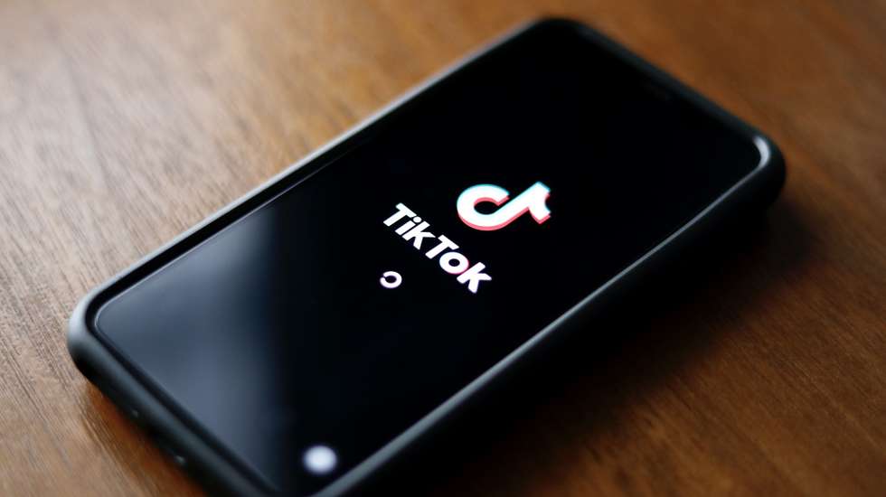 epa10351128 The Tiktok application logo is pictured on a smartphone in Taipei, Taiwan, 06 December 2022. On 02 December, the The US Federal Bureau of Investigation (FBI) warned about Tiktok, that it presents national security concerns in regards to the integrity of the application's algorithm. On 05 December, a Ministry of Digital Affairs (MODA) official announced that the application have been deemed to be 'harmful product against national information security.'  EPA/RITCHIE B. TONGO