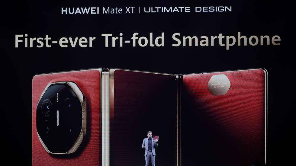 epa11904234 Andreas Zimmer, senior product expert, speaks during a product launch event in Kuala Lumpur, Malaysia, 18 February 2025. Chinese tech giant Huawei unveiled the Huawei Mate XT, the world’s first tri-fold smartphone for its international market, at the Kuala Lumpur launch.  EPA/MUKHRIZ HAZIM