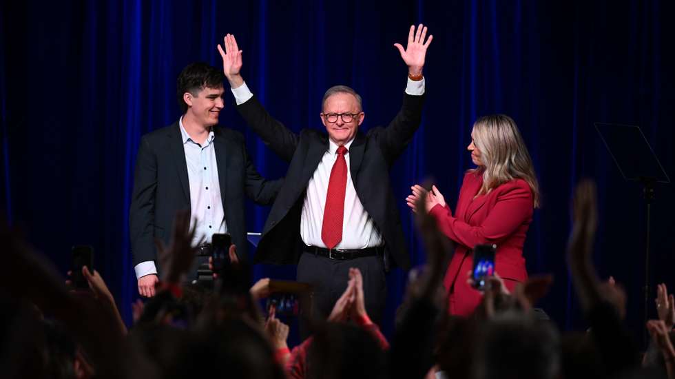 epa12071017 Prime Minister Anthony Albanese takes to the stage with his son Nathan and partner Jodie Haydon as his supporters celebrate Labor’s Federal election win during a reception at Canterbury-Hurlstone Park RSL Club in Hurlstone Park, Sydney, Australia, 03 May 2025.  EPA/DEAN LEWINS AUSTRALIA AND NEW ZEALAND OUT