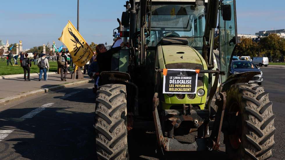 epa12452983 French farmers with tractors take part in a protest against the EU-Mercosur free trade agreement, on Esplanade des Invalides, in Paris, France, 14 October 2025. The French farmers' union 'Confederation Paysanne' called for a mobilization in Paris to demand fair and regulated international trade, denouncing free trade agreements (EU-Mercosur, EU-Mexico) that threaten farmers' incomes, human rights, biodiversity, and food sovereignty.  EPA/MOHAMMED BADRA