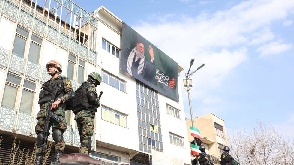 epa12806144 Iranian police stand guard as Iranians gather at Enqelab Square to show support for the newly appointed Supreme Leader Ayatollah Mojtaba Khamenei in Tehran, Iran, 09 March 2026. The late Supreme Leader Ayatollah Ali Khamenei was killed during a joint Israeli and US military operation across Iran in the early hours of 28 February 2026.  EPA/ABEDIN TAHERKENAREH