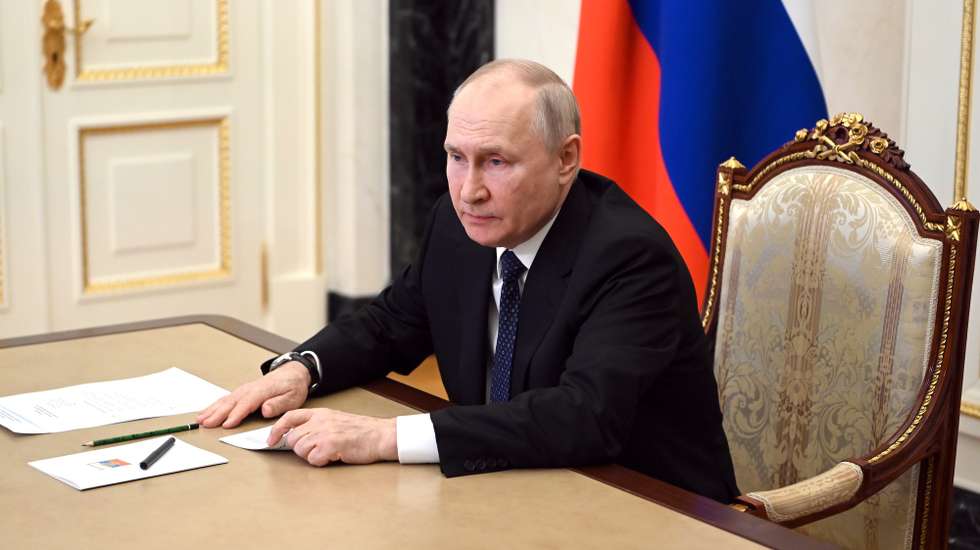 epa10752114 Russian President Vladimir Putin attends a video conference from the Moscow Kremlin to discuss an emergency on Crimean Bridge, in Moscow, Russia 17 July 2023. The Investigative Committee of Russia said that one of the sections of the Crimean bridge was damaged in the night of 16 to 17 July. Two civilians, a man and a woman, were killed while driving a car across the bridge; their minor daughter was injured in the incident, the statement added. Russia has blamed 'special services of Ukraine' for the 'attack', and said it launched a criminal investigation into the incident.  EPA/ALEXANDER KAZAKOV / SPUTNIK / KREMLIN POOL