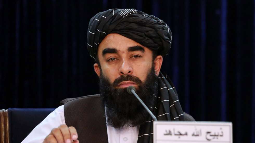 epa09574188 Zabihullah Mujahid, Taliban's spokesman sits with Khalil Hamraz (not pictured), spokesman for the Taliban's intelligence service, as they talk with journalists during a press conference in Kabul, Afghanistan, 10 November 2021. Hamraz briefed the media about Talban's operation against IS militants in which about 600 ISIS militants were killed in last three months. The Taliban have been pursuing a nationwide clearance operation against Daesh for the past several weeks in Afghanistan and so far have killed or arrested dozens of Daesh fighters in at least eight of the 34 Afghan provinces.  EPA/STRINGER
