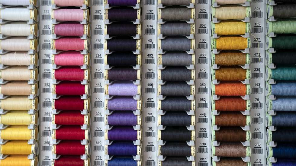 epa08387725 Spools of thread of many colors are on display at the ScrubHub in Central London, Britain, 27 April 2020. The ScrubHub is a grassroots organization staffed by volunteers than encourages Britons to make surgical scrubs for medical workers of the United Kingdom's National Health Service (NHS) who may need them amid the ongoing pandemic of the COVID-19 disease caused by the SARS-CoV-2 coronavirus.  EPA/WILL OLIVER