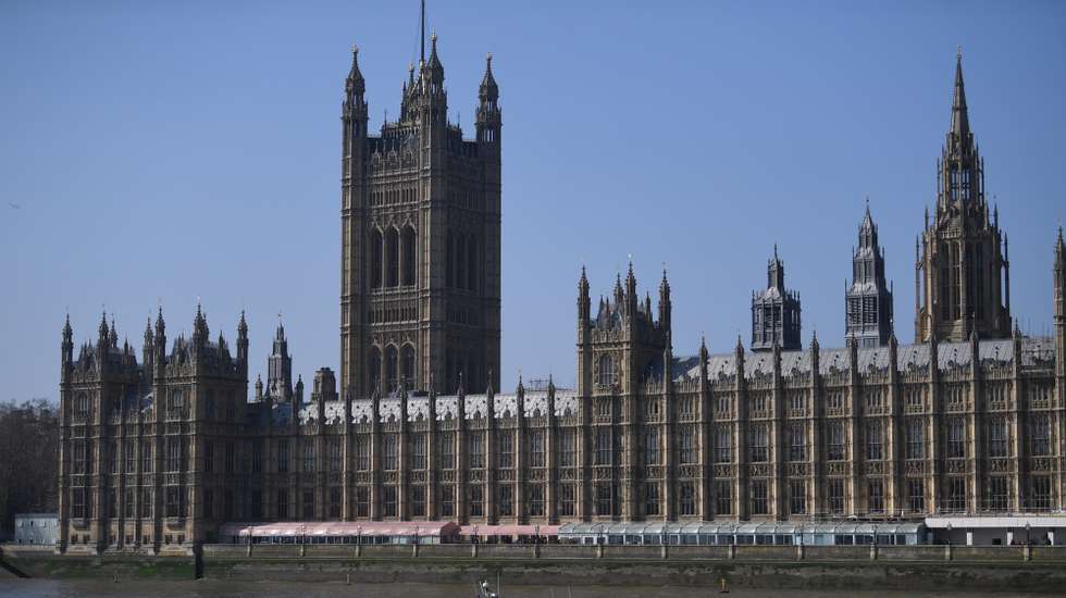epa07470965 A police boat patrols the waters in front of the Parliament in London, Britain, 29 March 2019. MPs are debating in the Houses of Parliament the withdrawal agreement for the third time.  EPA/NEIL HALL