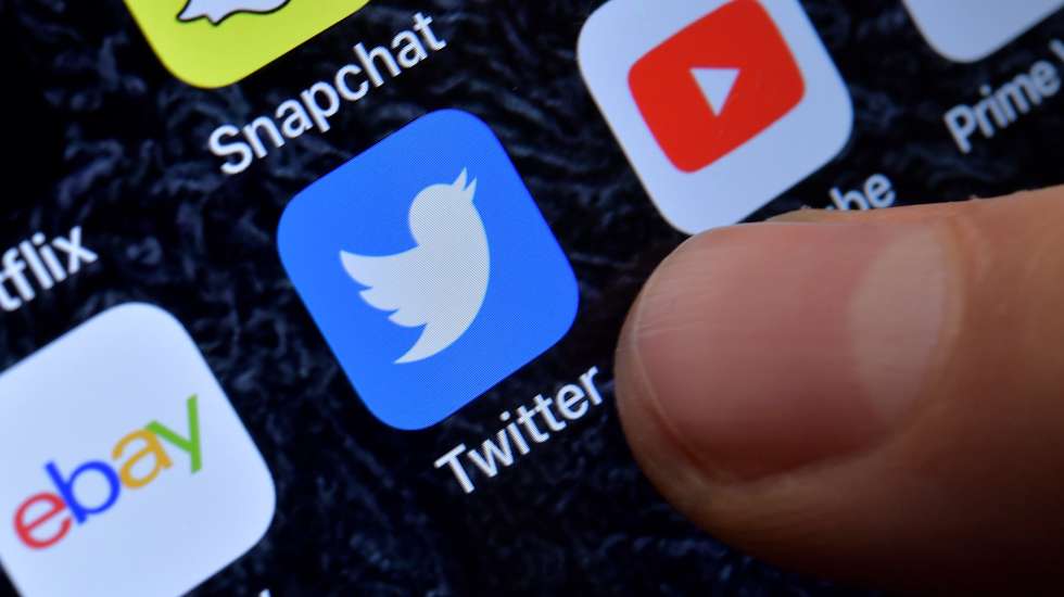 epa08931624 (FILE) - A close-up image showing the app of the micro blogging service Twitter on an iPhone in Kaarst, Germany, 08 November 2017 (reissued 11 January 2021). Media reports 11 January 2021 state Twitter share price fell up to 10 per cent it trading before the markets opened in USA, after it banned US President Donald Trump from its service on 08 January 2021.  EPA/SASCHA STEINBACH *** Local Caption *** 53883438