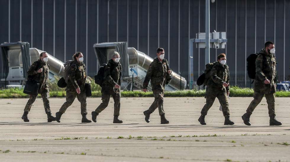 German military health professionals arrive at the airbase at Figo Maduro, in Lisbon, 03 February 2021. The German Armed Forces (Bundeswehr) decided to launch a relief mission against the coronavirus disease (covid-19) pandemic for Portugal within the framework of humanitarian emergency and disaster relief. For this purpose, an Airbus A400M of the German Air Force took off on the day for Lisbon Airport with a medical aid team and numerous medical equipment and medical products.  MARIO CRUZ/LUSA