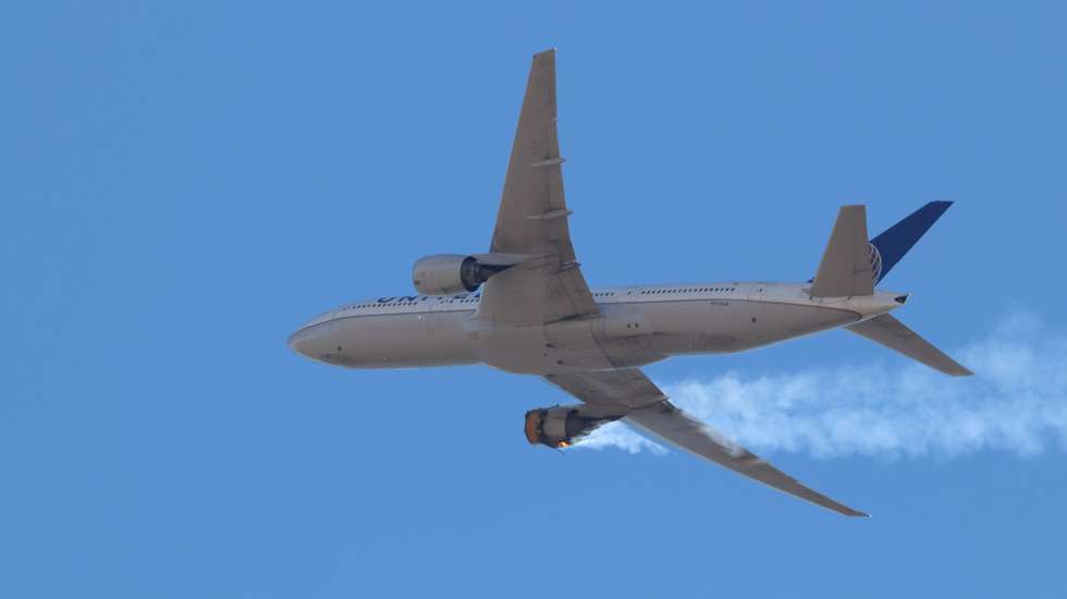 epa09028736 A photo provided by Instagram user Hayden Smith (speedbird5280) shows United Airlines flight 328 (Boeing 777-200, tailnumber N772UA) with an engine on fire, near Denver, Colorado, USA, 20 February 2021 (issued 21 February 2021). United Airlines flight 328 from Denver to Honolulu experienced right-engine failure shortly after takeoff and had to return to Denver International Airport (DEN). Debris from the plane dropped over Broomfield, Colorado with no injuries reported so far. All 241 people on the plane, including 10 crew members, are unharmed.  EPA/Hayden Smith  MANDATORY CREDIT  EDITORIAL USE ONLY