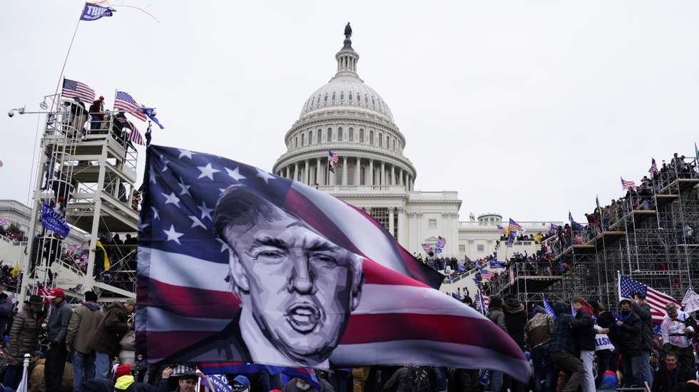 epaselect epa08923664 Pro-Trump protesters storm the grounds of the US Capitol, in Washington, DC, USA, 06 January 2021. Various groups of Trump supporters have broken into the US Capitol and rioted as Congress prepares to meet and certify the results of the 2020 US Presidential election.  EPA/WILL OLIVER