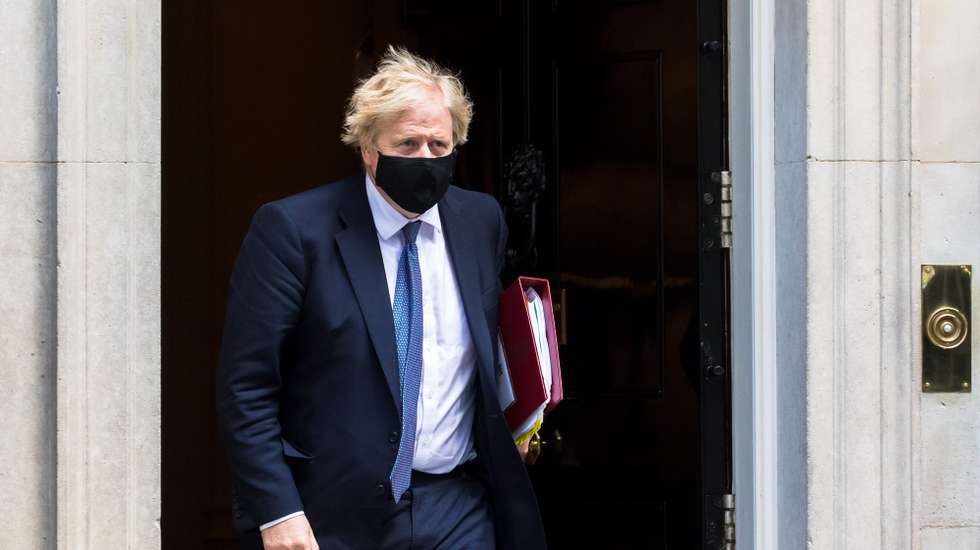 epa09211359 British Prime Minister Boris Johnson departs 10 Downing Street for Prime Minister Questions at parliament in London, Britain, 19 May 2021. Johnson faces the MPs' weekly question time in the House of Commons.  EPA/VICKIE FLORES