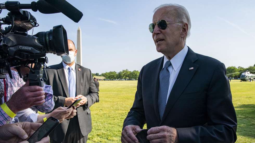 epa09227800 US President Joe Biden talks to the media before taking off in Marine One on the Ellipse at the White House in Washington, DC, USA, 25 May 2021. US President Joe Biden Departs White House for Delaware for a few hours Tuesday night.  EPA/TASOS KATOPODIS / POOL