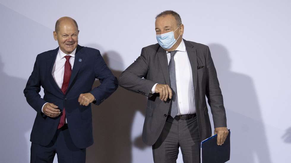 epa08660590 German Finance Minister and Vice Chancellor Olaf Scholz (L) welcomes Slovenia's Finance Minister Andrej Sircelj prior to an informal meeting of European Union ministers for economic and financial affairs in Berlin, Germany, 11 September 2020. The meeting is taking place under the current German presidency of the European Council.  EPA/Maja Hitij / POOL