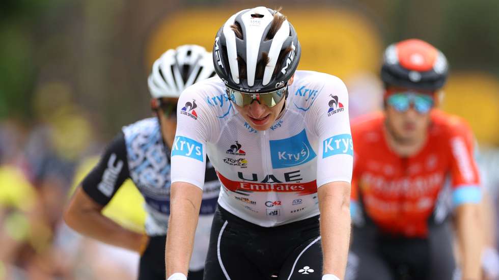 epa09318203 Slovenian rider Tadej Pogacar of UAE-Team Emirates reacts as he crosses the finish line of the 7th stage of the Tour de France 2021 over 249.1 km from Vierzon to Le Creusot, France, 02 July 2021.  EPA/Tim de Waele / POOL
