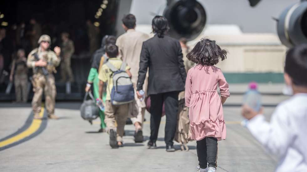 epa09427820 A handout photo made available by the US Marine Corps via DVIDS showing families begin to board a US Air Force Boeing C-17 Globemaster III during an evacuation at Hamid Karzai International Airport, Kabul, Afghanistan, 23 August 2021. US service members are assisting the Department of State with an orderly drawdown of designated personnel in Afghanistan. EPA/Sgt. Samuel Ruiz / US Marine Corps via DVIDS / HANDOUT ReleasedMaj. John RigsbeeU.S. Central Command Public AffairsJohn.j.rigsbee.mil@mail.mil(813) 529-0214via DVIDS HANDOUT EDITORIAL USE ONLY/NO SALES