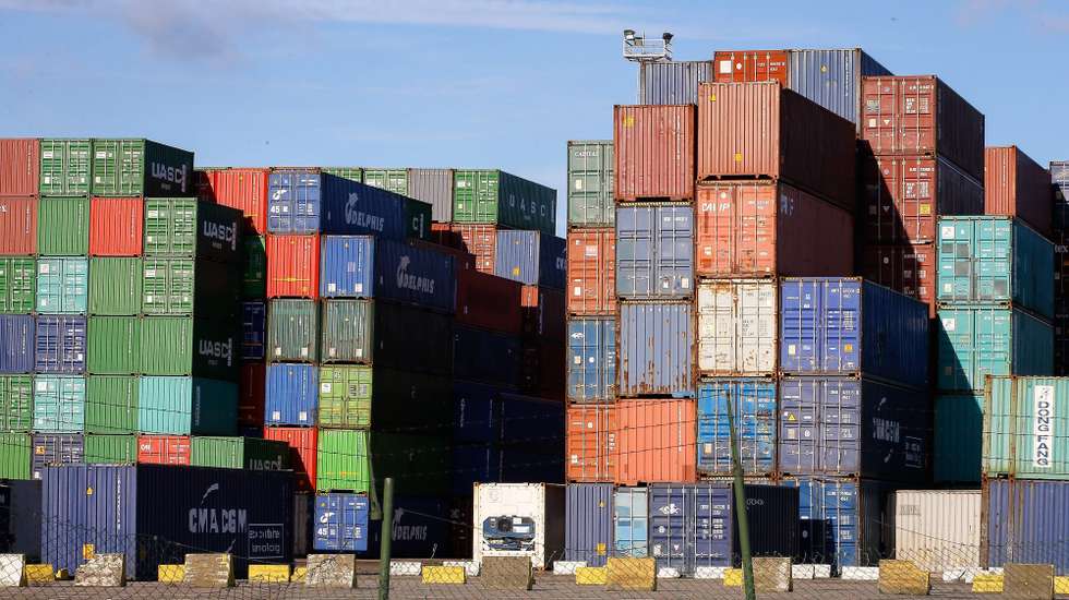 epa04502086 Freight containers are stacked high in  the port of Antwerp, Belgium, 24 November 2014 as dock workers down tools in a strike.  Belgium is bracing itself for multiple strikes in the upcoming weeks, in the lead up up to a general national strike planned for  15 December.  EPA/JULIEN WARNAND